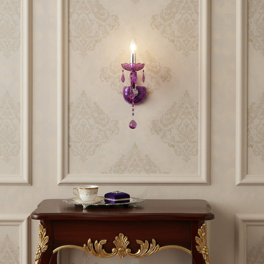 Wall light with bright pink acrylic frame and crystal droplets styled on a soft wall background for bold modern home lighting.