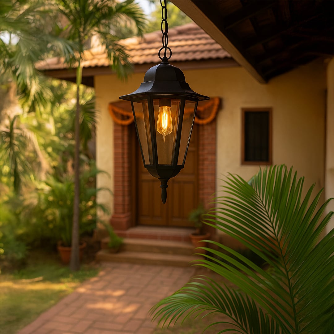 Black hanging lantern light adding a timeless touch and warm illumination to modern home exteriors.