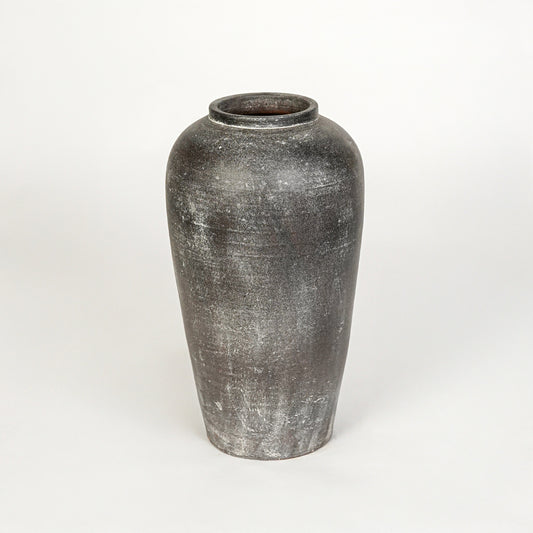 White background image of grey ceramic decorative vase for modern floor placement with rustic textured finish.