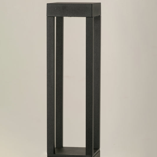 Closeup of black metal outdoor bollard light frame for modern exterior decor styling use.
