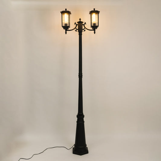 Vintage outdoor street lamp with dual glowing lanterns for elegant exterior decor styling use.