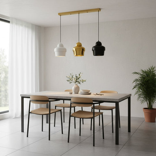 Modern white gold and black pendant lights adding a stylish decorative touch to a bright contemporary room interior.