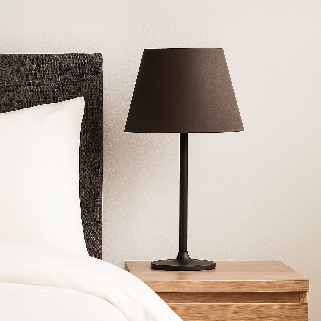 Brown tapered lampshade styled in a warm modern room adding a soft elegant accent and creating gentle ambient lighting for decor.