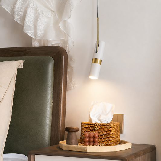 Lifestyle image of white rotating spotlight modern pendant light for elegant living room decor styling and contemporary home lighting.