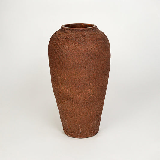 White background image of terracotta ceramic decorative vase for rustic floor placement with textured finish.