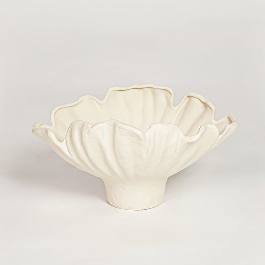 White ceramic floral decorative bowl with soft petal shape isolated on clean white background for contemporary interior decor use.