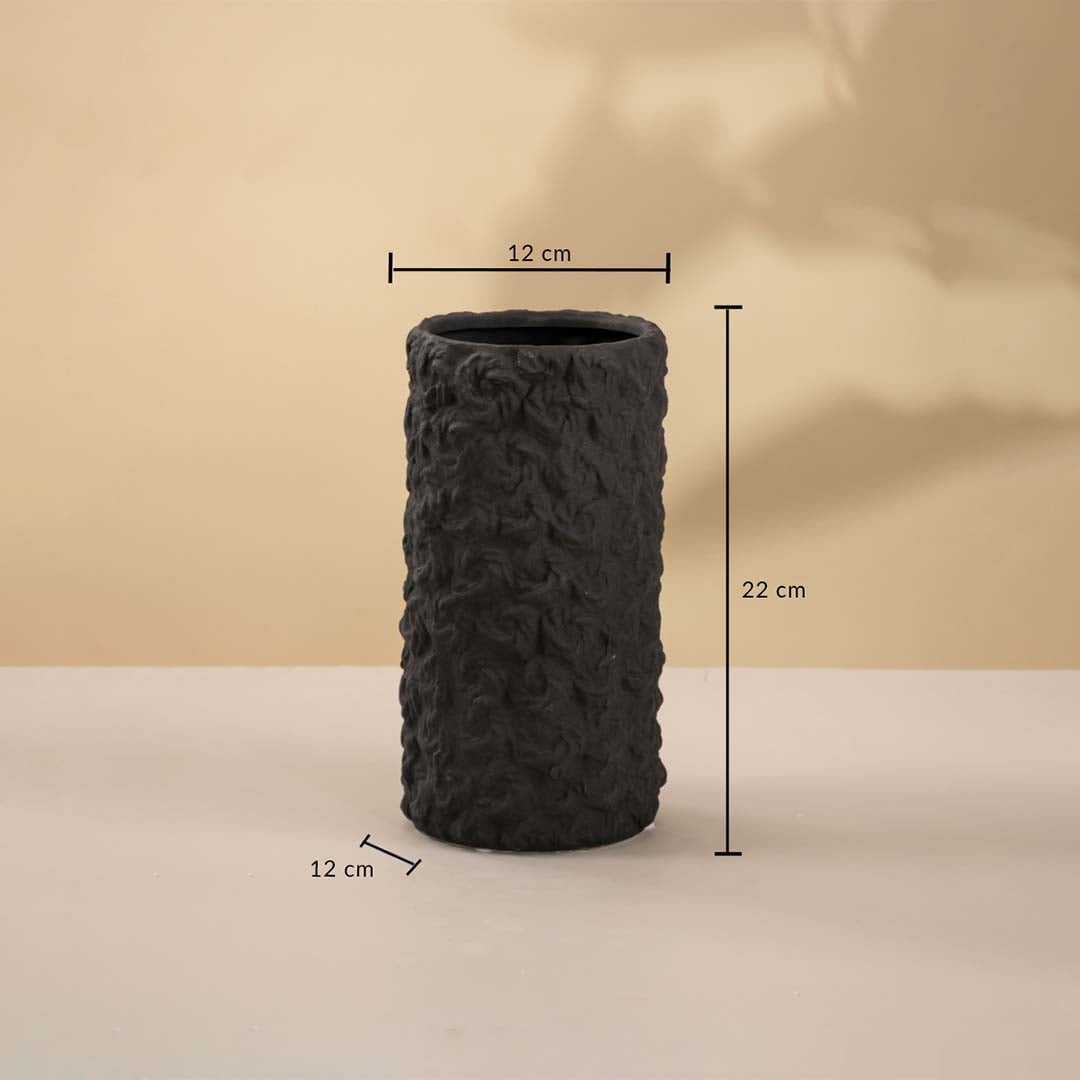 Black cylindrical ceramic vase featuring 22 cm height and 12 cm width displayed on a white background.