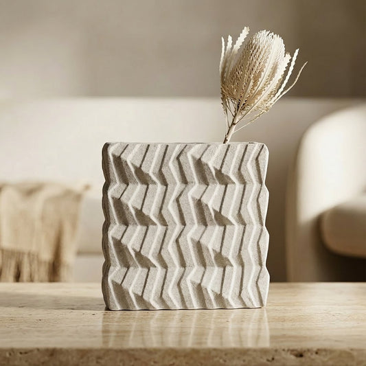 White ceramic decorative vase with dried flowers placed on table modern flower vase for living room decor styling.