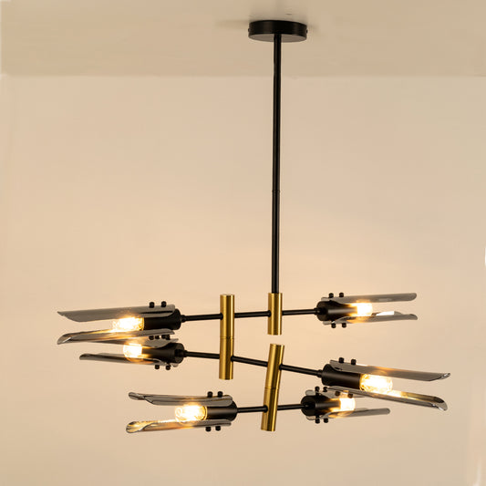 Black and gold metal chandelier with exposed bulbs designed for striking modern ceiling lighting in contemporary interiors.