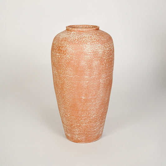 White background image of peach ceramic decorative vase for elegant floor placement with matte textured finish.