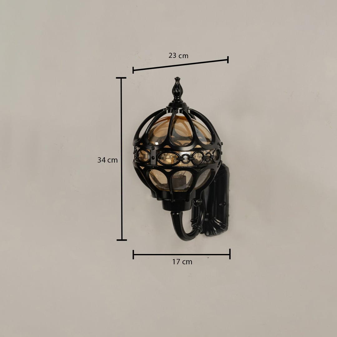 Black metal outdoor globe lantern wall light with dimensions 34 cm height 23 cm width and 17 cm depth shown clearly for accurate size reference.