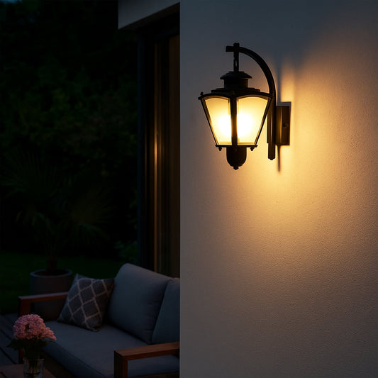 Black metal outdoor wall lantern mounted on exterior wall providing classic ambient lighting for porch gate and balcony Decor.