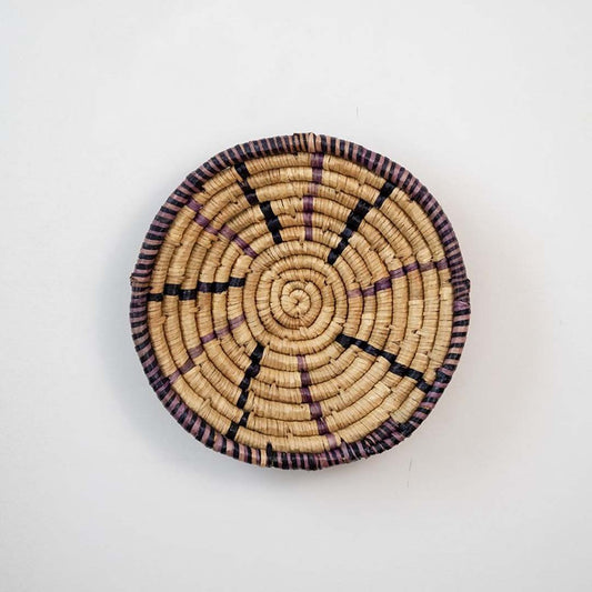 Brown and natural woven decorative wall basket with geometric pattern for artistic wall styling and contemporary home decor.