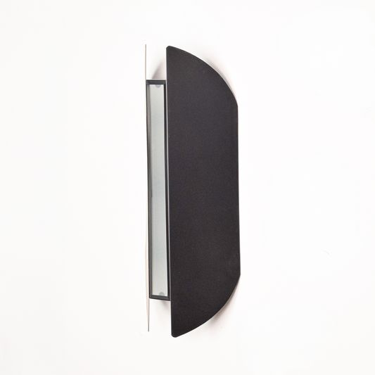 Wall light switched off on black background displaying bold sculptural silhouette with layered curved panels for dramatic interior styling.