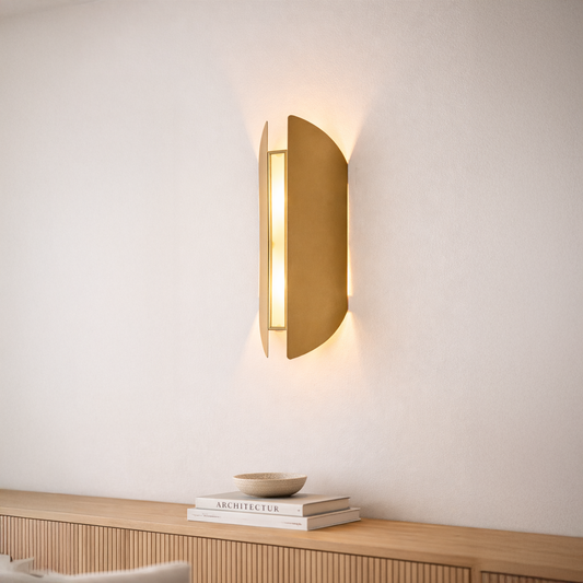 Wall light styled on clean white wall above wooden console with gold curved metal panels casting soft ambient glow for modern luxury Decor interiors.