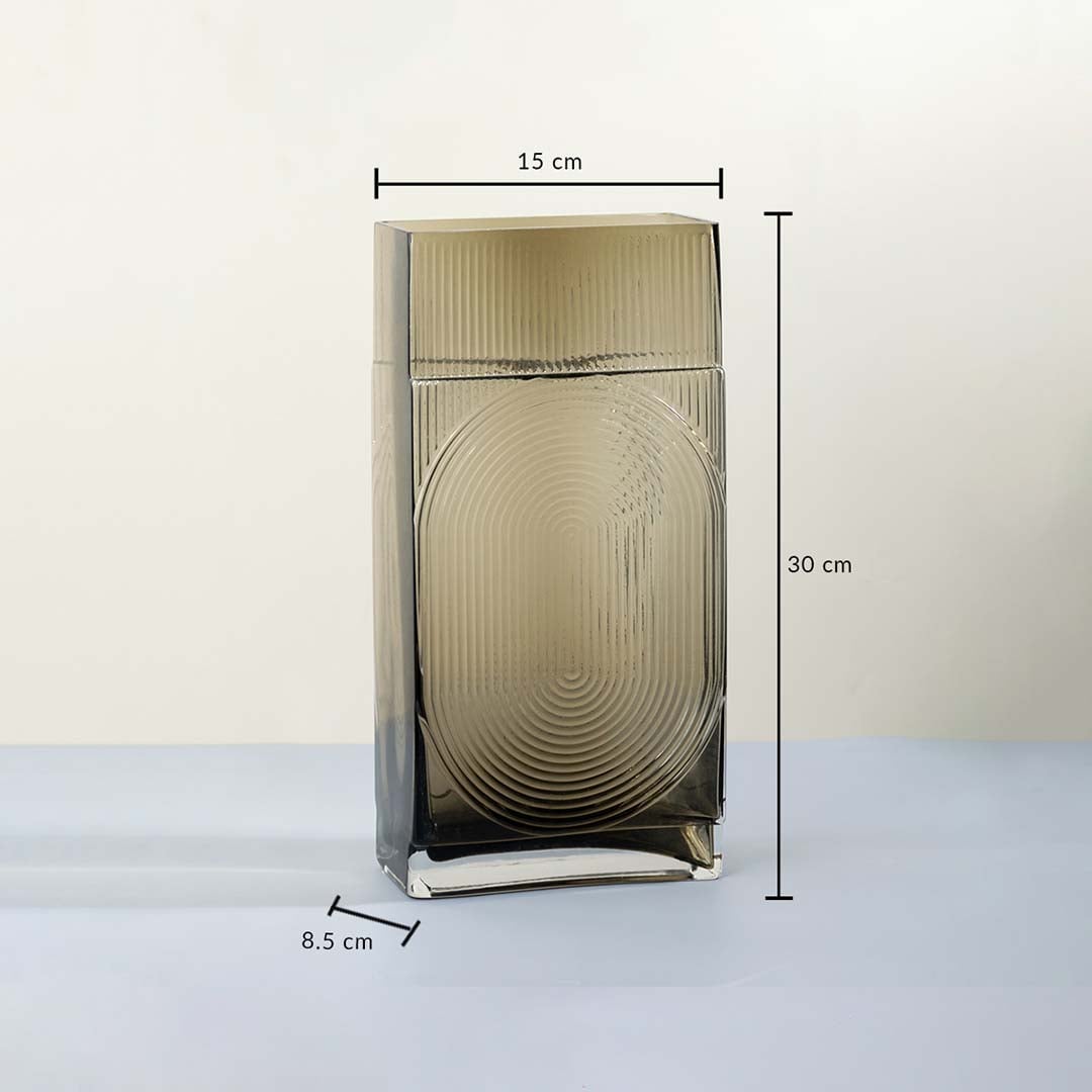 Ribbed glass vase 30 cm height 15 cm width 8.5 cm depth smoke brown rectangular tall design light on white background for modern decor.