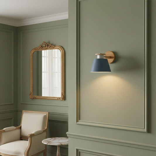 Modern blue metal wall light with warm glow for elegant living room and luxury home decor styling spaces.