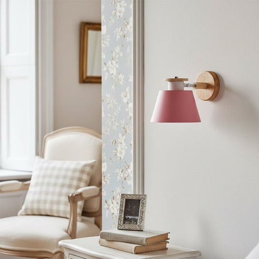 Modern pink metal wall light for stylish bedroom living room and luxury home decor styling spaces.