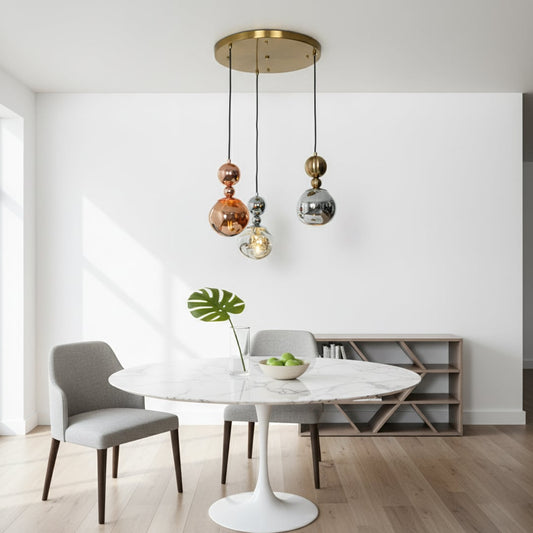 Gold chrome and copper cluster pendant lights hanging in a modern room adding a stylish decorative touch to contemporary interiors.