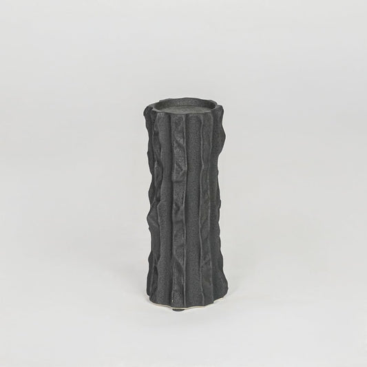Modern black decorative candle holder isolated clean background stylish ceramic candle stand for home decor accent.