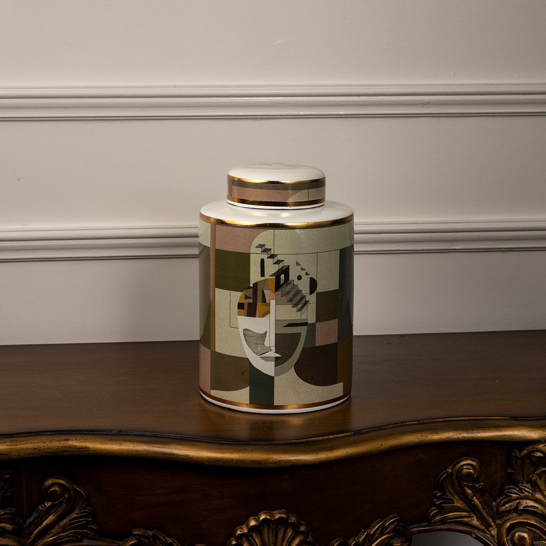 Elegant Abstract Face ceramic jar photographed on a white background showing its cubist-inspired facial design and soft matte finish.