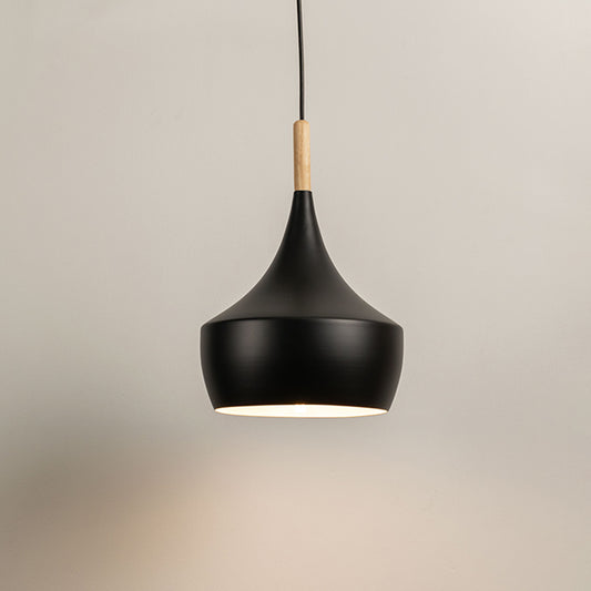 Black metal pendant light with curved shade and wooden top on neutral background modern minimal lighting for kitchen and dining decor.