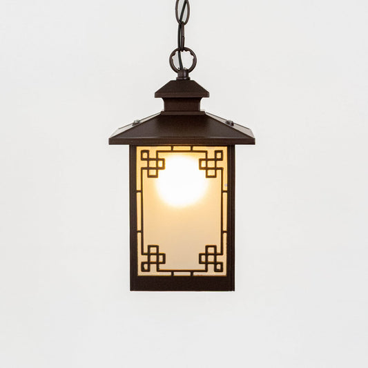 A classic rectangular hanging lantern light turned on displayed against a white background highlighting its frosted glass panels and geometric metal frame with warm illumination.