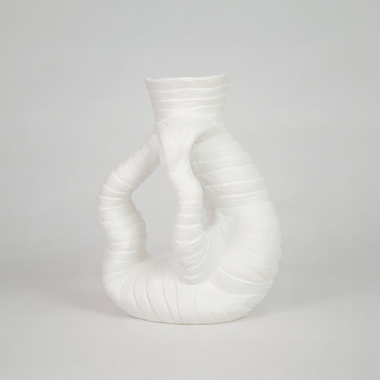 White textured ceramic vase for modern console table placement and elegant indoor home decor styling accent piece.