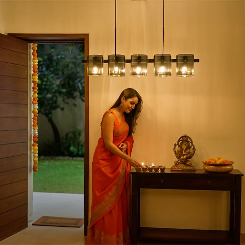 Festive decorative lights ideas with warm wall lighting and elegant home decor for festive season styling.