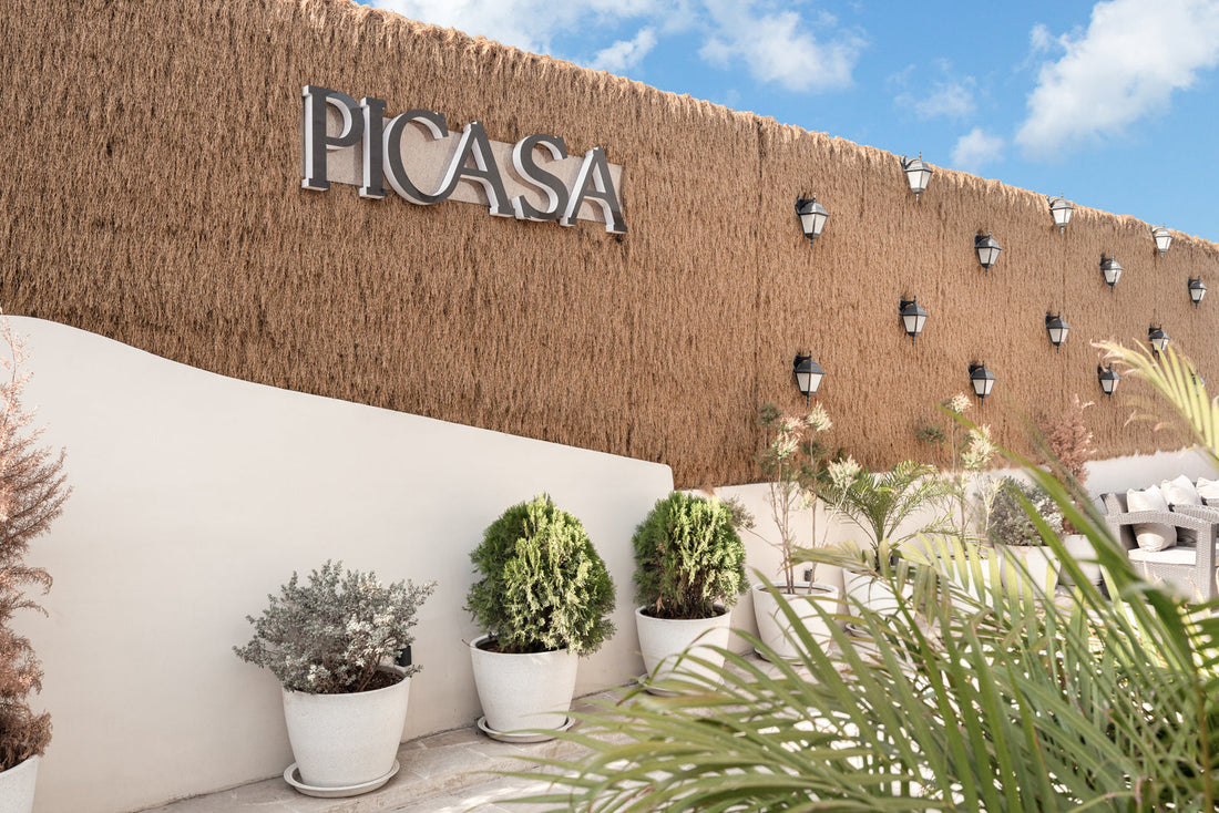Luxury hotel exterior with modern architecture plants and premium stay ambiance for travel inspiration.