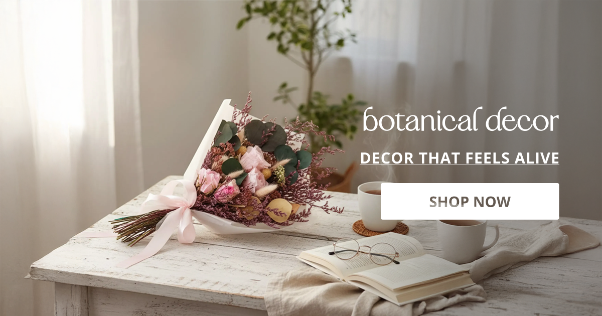 Botanical decor styled with fresh flowers on table creating soft natural aesthetic for modern home styling.