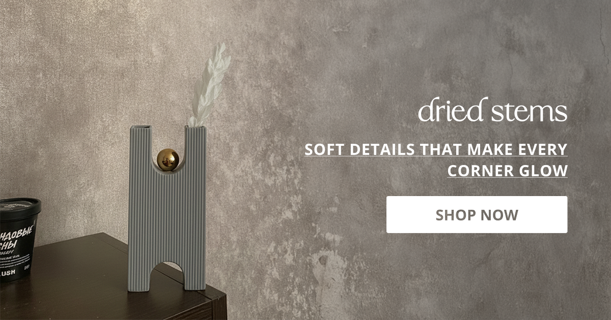 Natural dried stems in minimal vase arrangement perfect for aesthetic home decor styling with elegant neutral interior look.