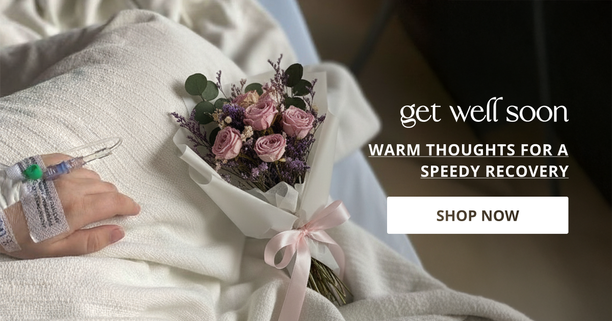 Get well soon decor styled with flowers and soft setup creating comforting warm ambiance for recovery moments.