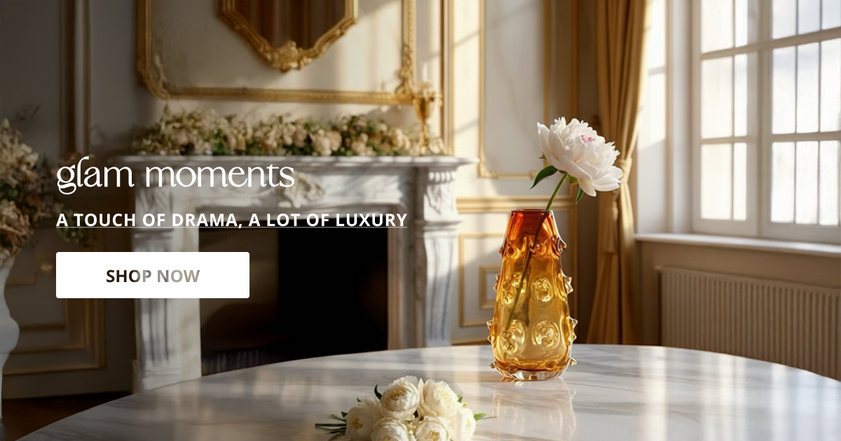 Glam style home decor with golden accents glass decor and luxury lighting perfect for elegant and stylish interior decoration.