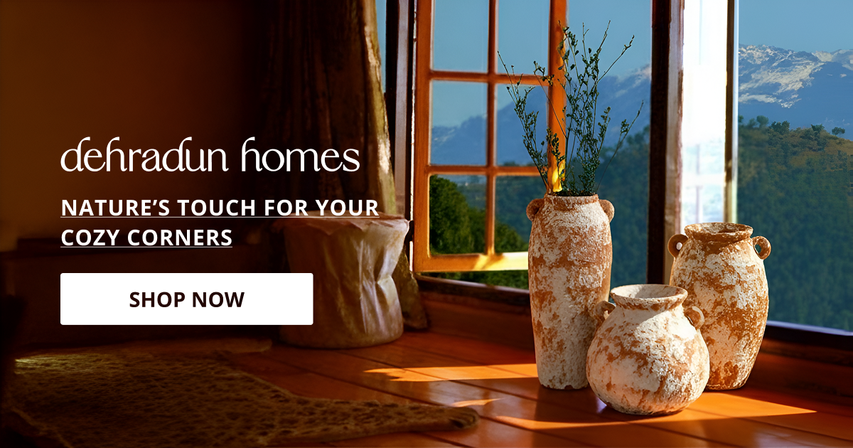 Home decor products in Dehradun styled with ceramic vases by window creating cozy natural light filled decor setup.