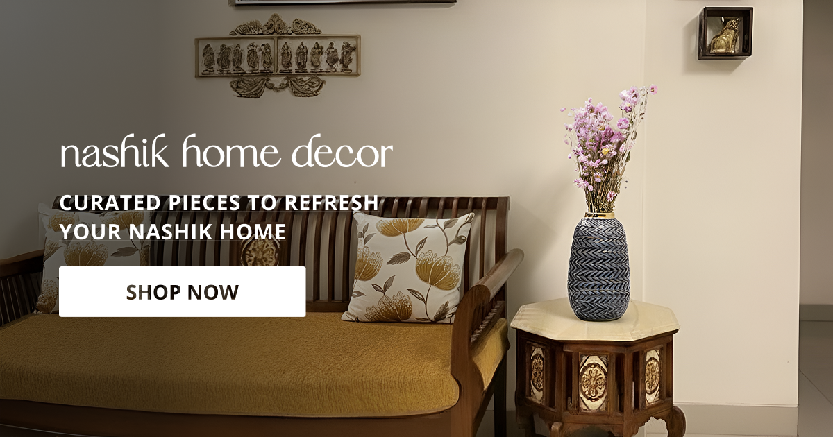Home decor products in Nashik styled with sofa and vase accents creating warm elegant modern living space.