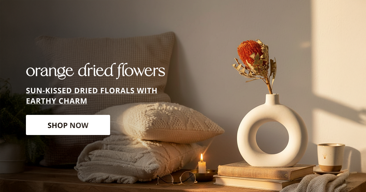 Orange dried flowers with natural decorative stems perfect for vase decor table styling and modern home interior.