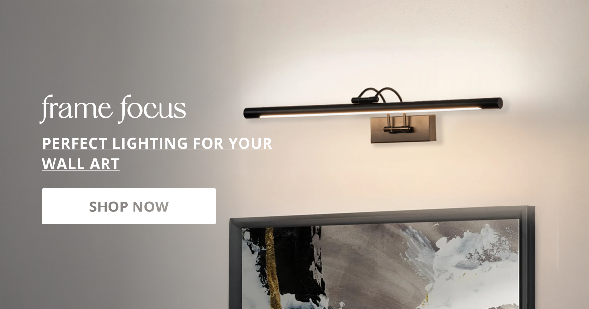 Modern picture lights illuminating wall artwork with elegant metal finish lighting perfect for stylish home interior decor.