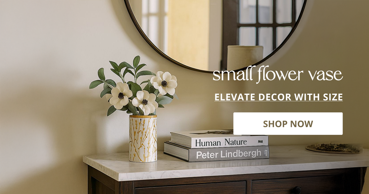 Small flower vase styled on console table with fresh blooms adding charm to cozy modern home decor.