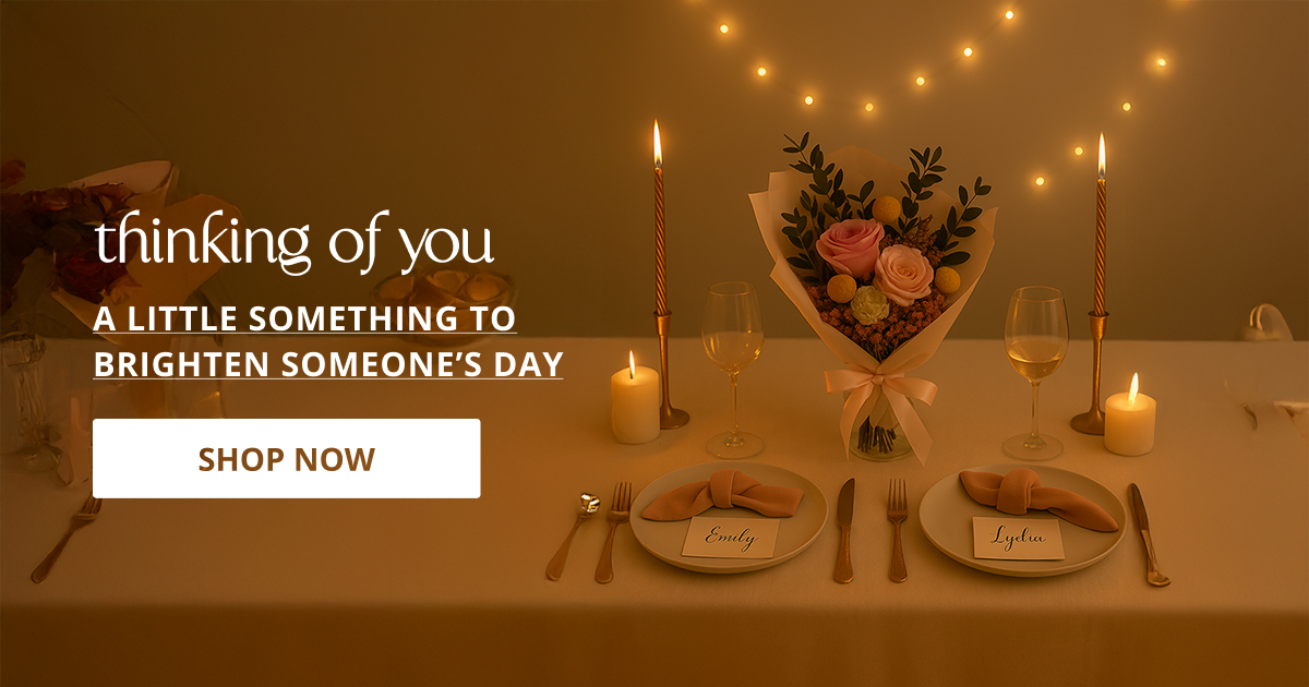 Thinking of you decor with flowers candles and soft elements perfect for emotional gifting and home decor styling.