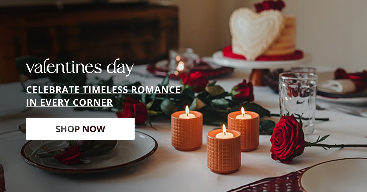 Valentines day decor styled with candles and table setup creating romantic cozy ambiance for special occasions.