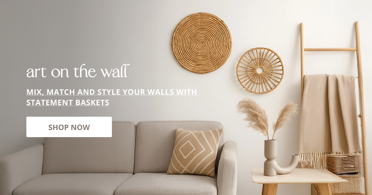 Wall basket decor set arranged above sofa creating artistic statement with natural woven texture interior look.