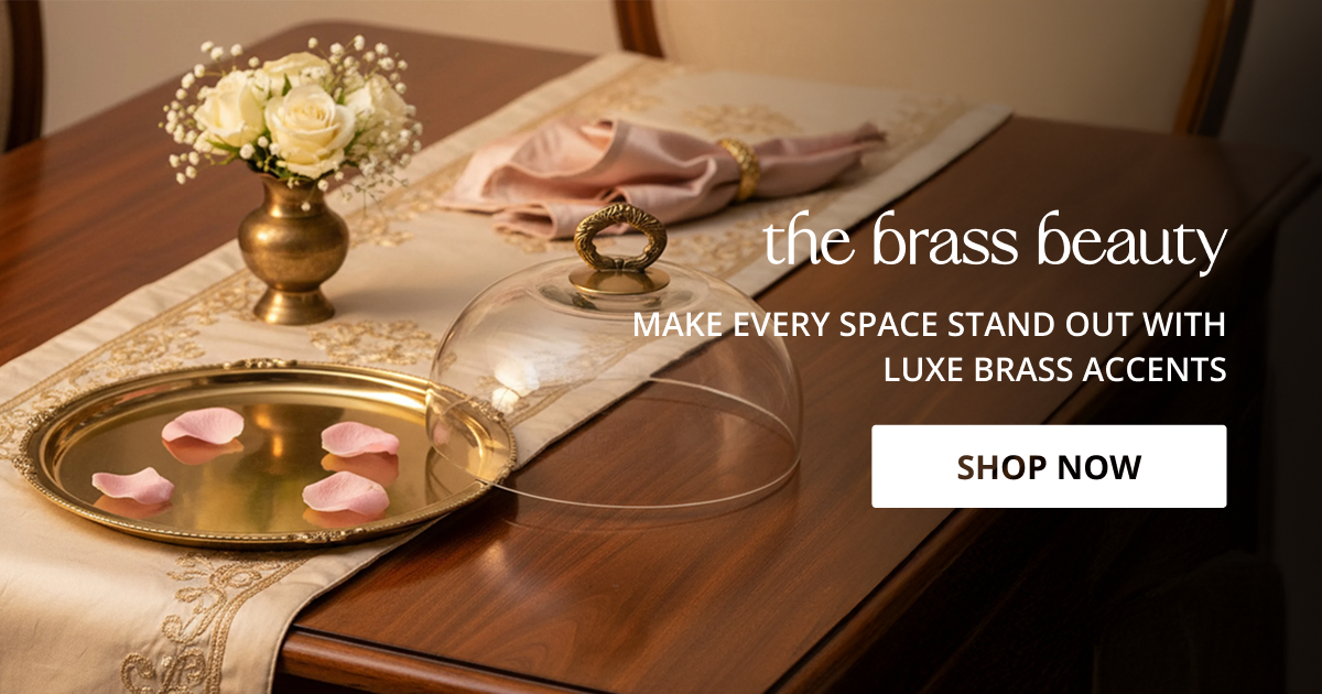 Brass collection decor styled with elegant tray and candles creating luxurious warm aesthetic for modern homes.