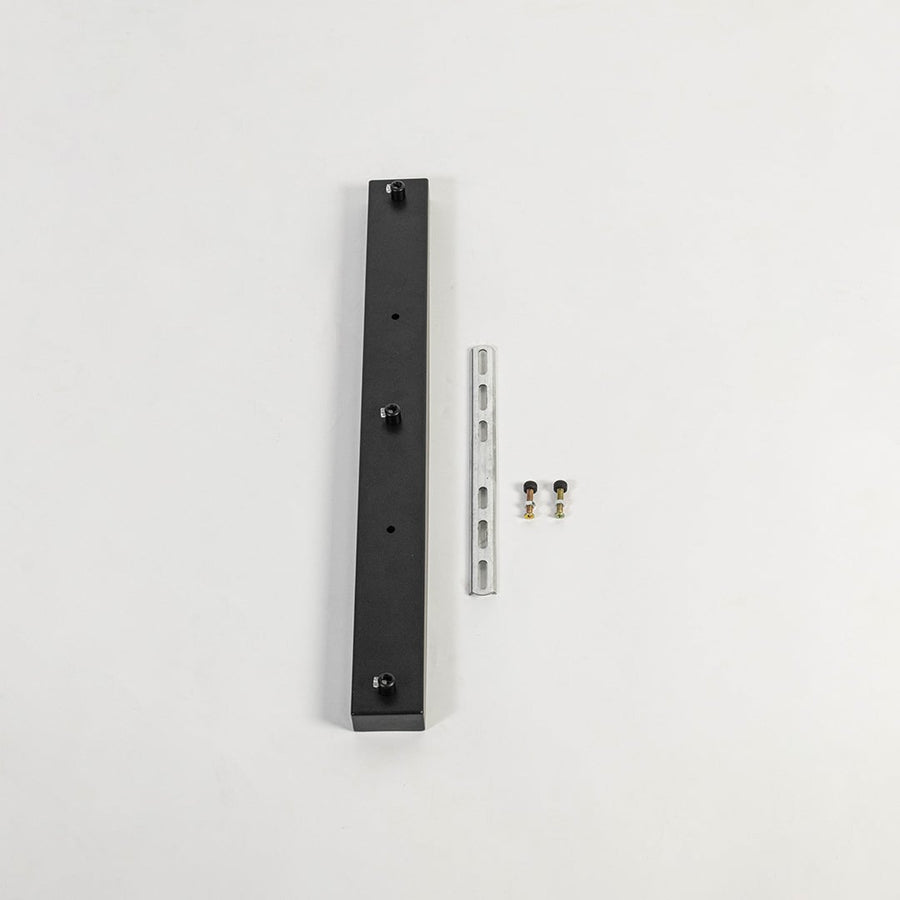 Black metal picture light mounting bar displayed on white background showcasing minimal design sturdy build and wall light installation support.