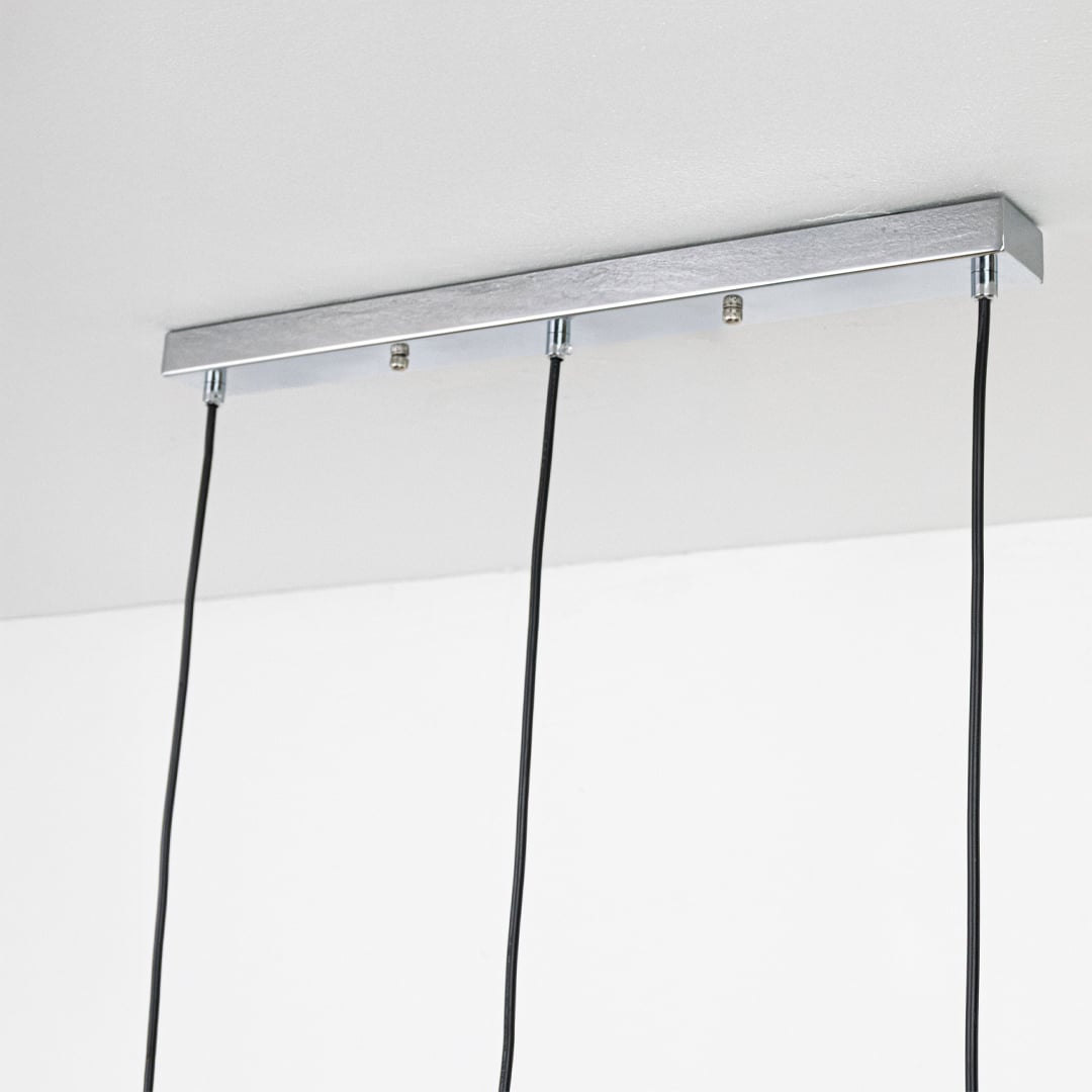 Black metal linear ceiling canopy highlighting minimalist design and premium finish details.