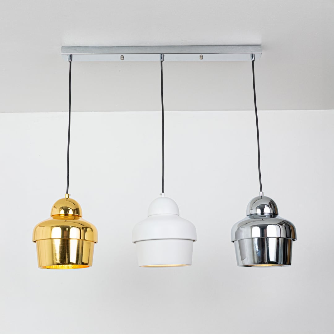 Gold white and chrome metal pendant lights showcasing stylish designs for contemporary home decor.
