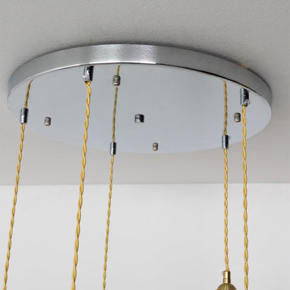 Silver metal round ceiling canopy with decorative chains highlighting refined craftsmanship and finish.