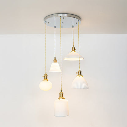 White metal pendant lights with gold accents showcasing stylish designs for modern home decor spaces.
