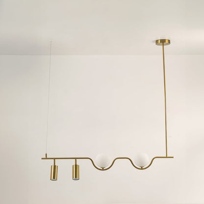 Gold metal linear chandelier on a white background with lights off highlighting its sculptural minimal modern form.
