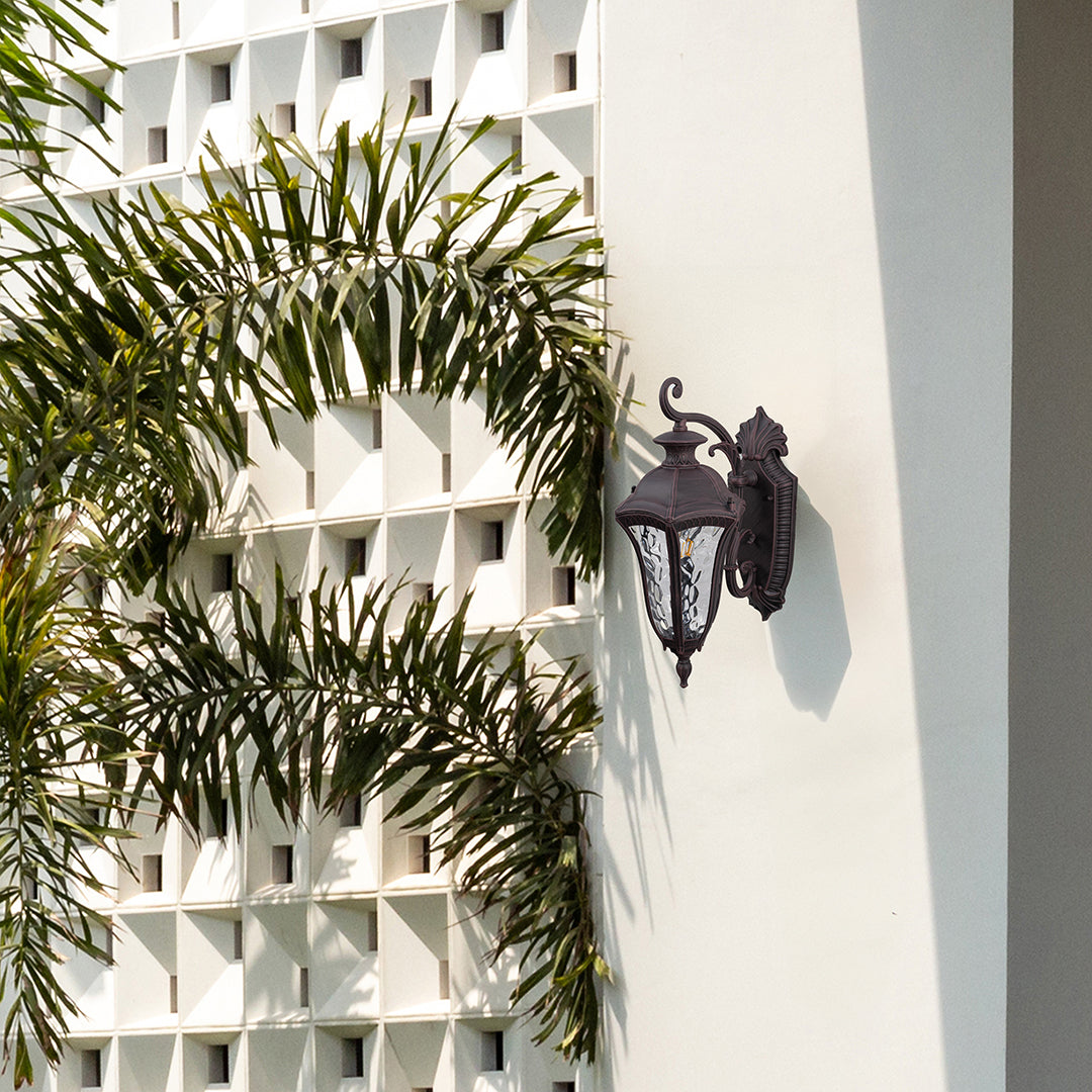 Decorative antique-style outdoor lantern enhancing home entrances with warm classic glow and detailed metal artistry.